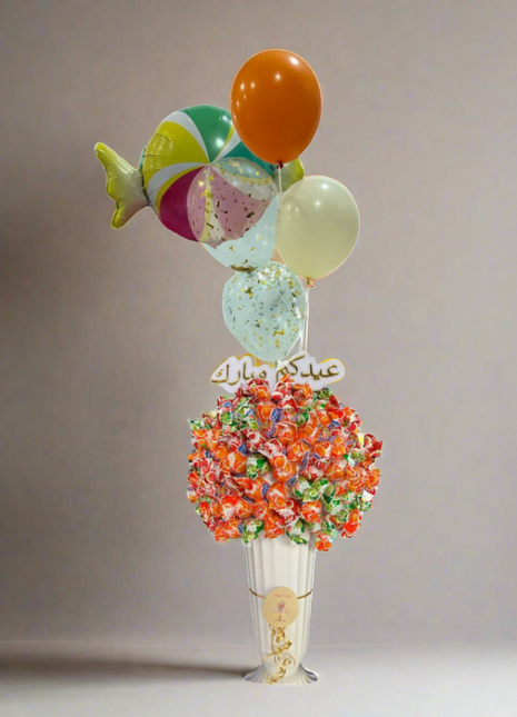فازة حلوى العيد مع البالونات