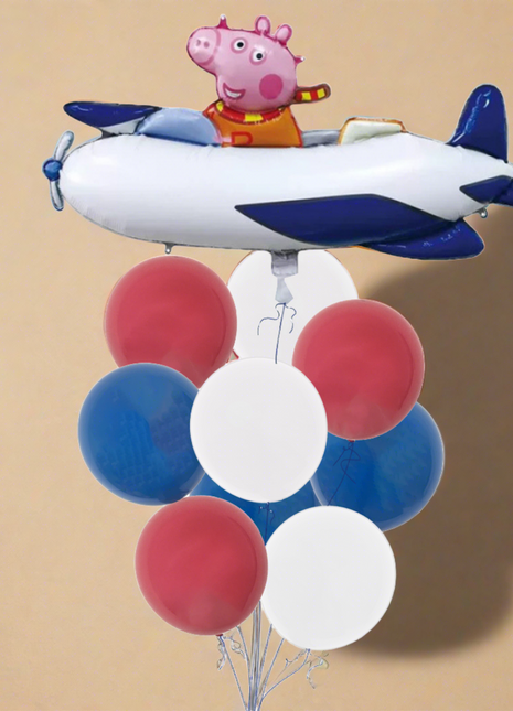 George in airplane balloon bouquet - Foil and latex balloons in various colors and shapes arranged to form a balloon bouquet with a George in airplane foil balloon as the centerpiece.