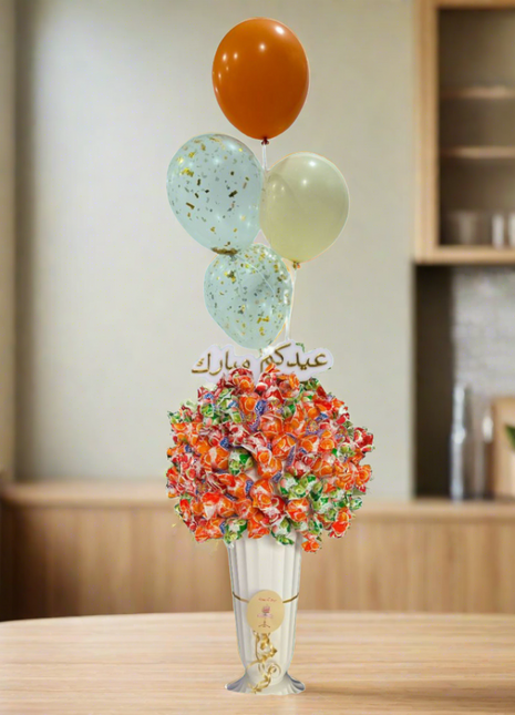 فازة حلوى العيد مع البالونات