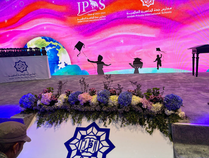 Stage, screens, flowers!